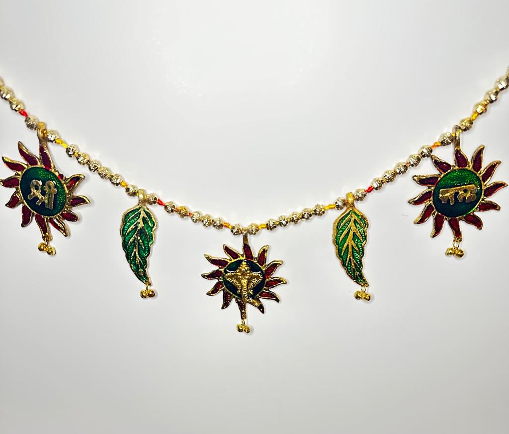 White metal thoran - Sun motifs